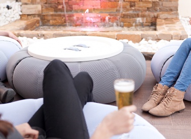 Button-shaped Outdoor Puff + Table by Nacho Timon
